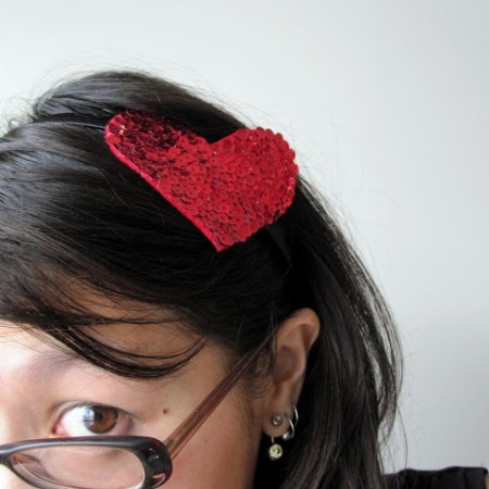 woman wearing heart headband