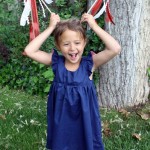Make simple ribbon wands with craft scraps and wooden dowels. Tutorial at Rae Gun Ramblings