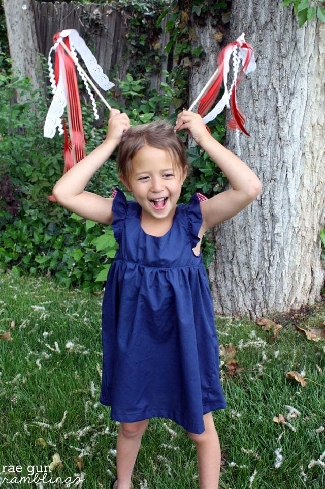 Make simple ribbon wands with craft scraps and wooden dowels. Tutorial at Rae Gun Ramblings