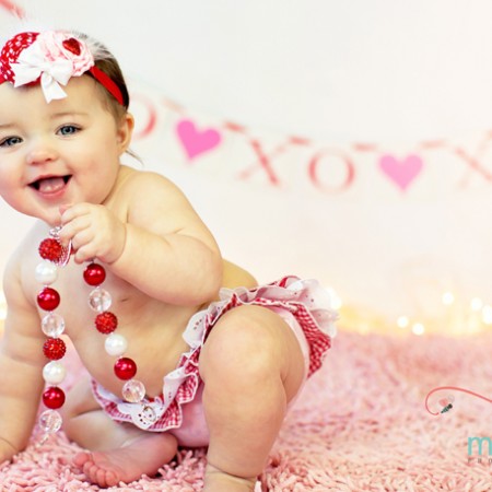 Darling Valentine's Day baby picture idea with cute raegunshop.com ruffle diaper coves